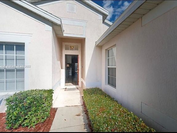 4th image of 8121 Fan Palm Way #0