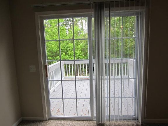 Deck with view of wooded preserve