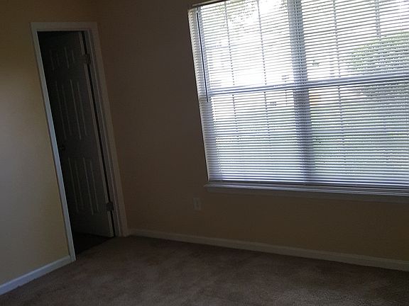 bed room with walk in closet