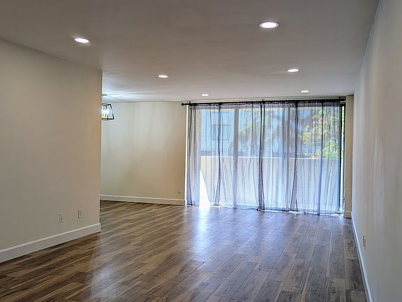 Living Room with balcony outside the sliding door