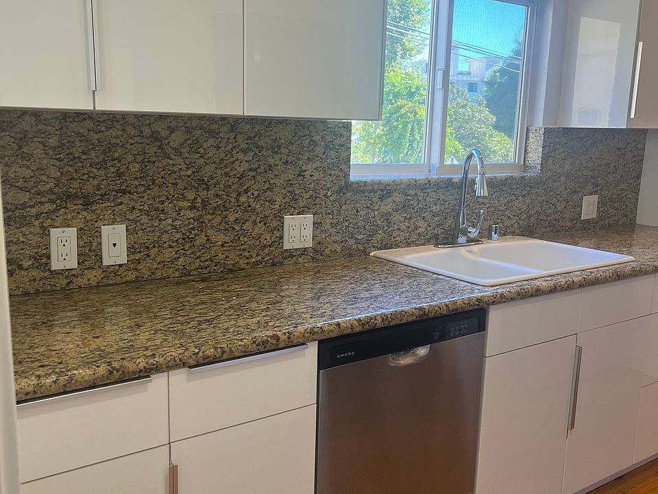 Kitchen: stainless steel appliances including NEW refrigerator & Dishwasher