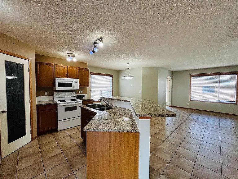 937 Arbour Lake Rd NW — Photo 3