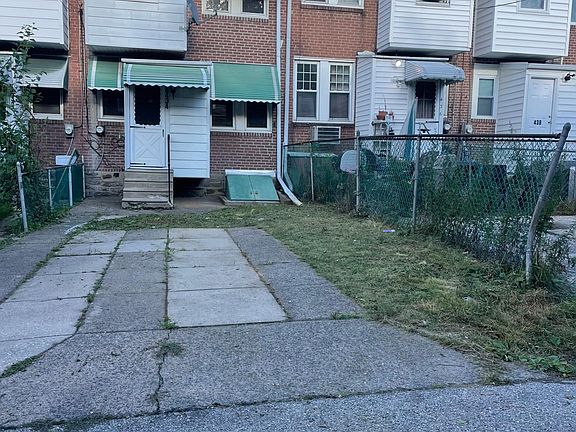 Rear of property with off street parking