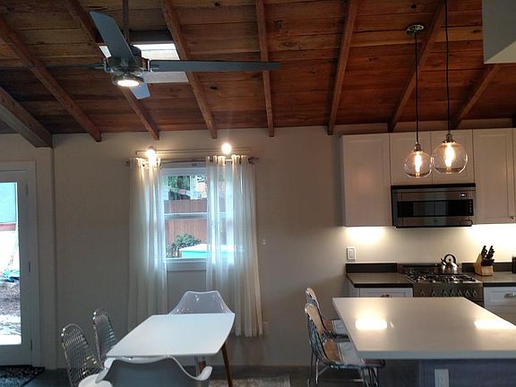 vaulted, and ceiling fans in every room