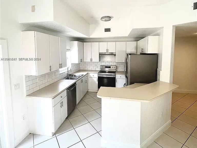 8885 SW 221st Ter — Photo 2