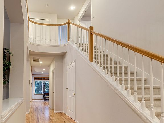 upgrade curved and open upstairs with skylight>