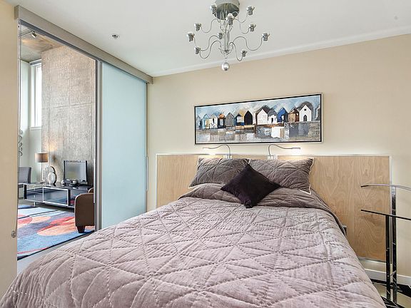 Bedroom with sliding doors for quite sleep, pull down blackout shades. (Bed queen size)