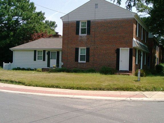 Side view showing large den addition