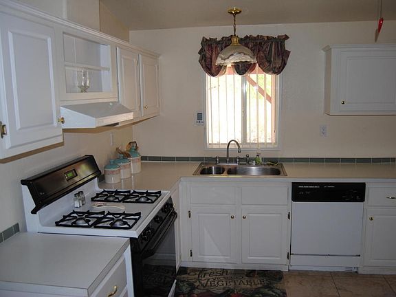 3rd image of 11122 W Old Buckboard Pl