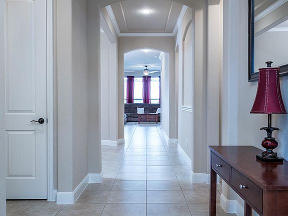 Welcome home! Neutral paint, oil rubbed bronze fixtures throughout, 18" tile and crown molding in entry.