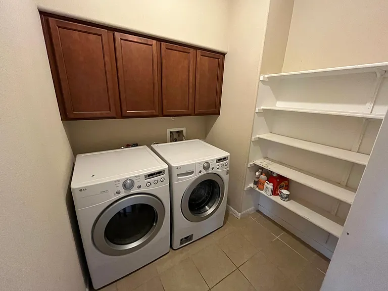 LG washer and dryer to stay. Dryer uses natural gas to save on utility bill