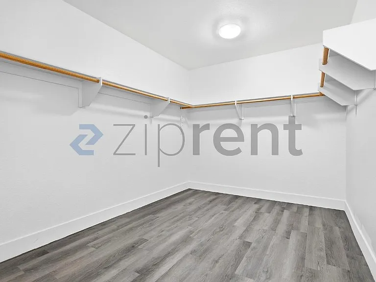 Primary Bedroom Walk-in Closet