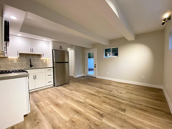 Large living room and kitchen area.