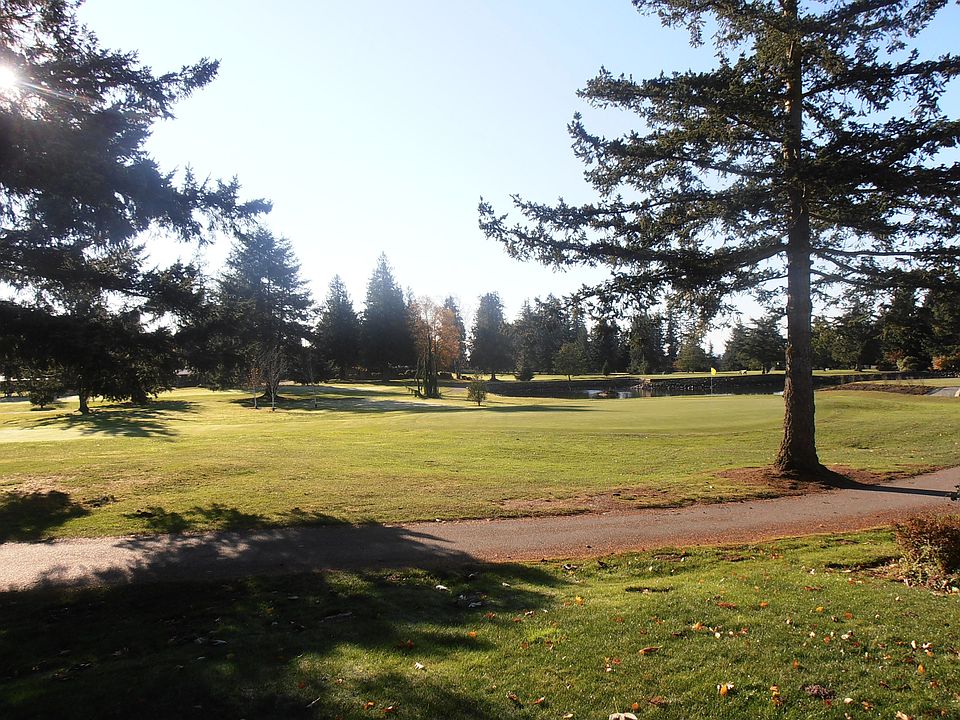 Beautiful View of the 10th Green with pond and water feature