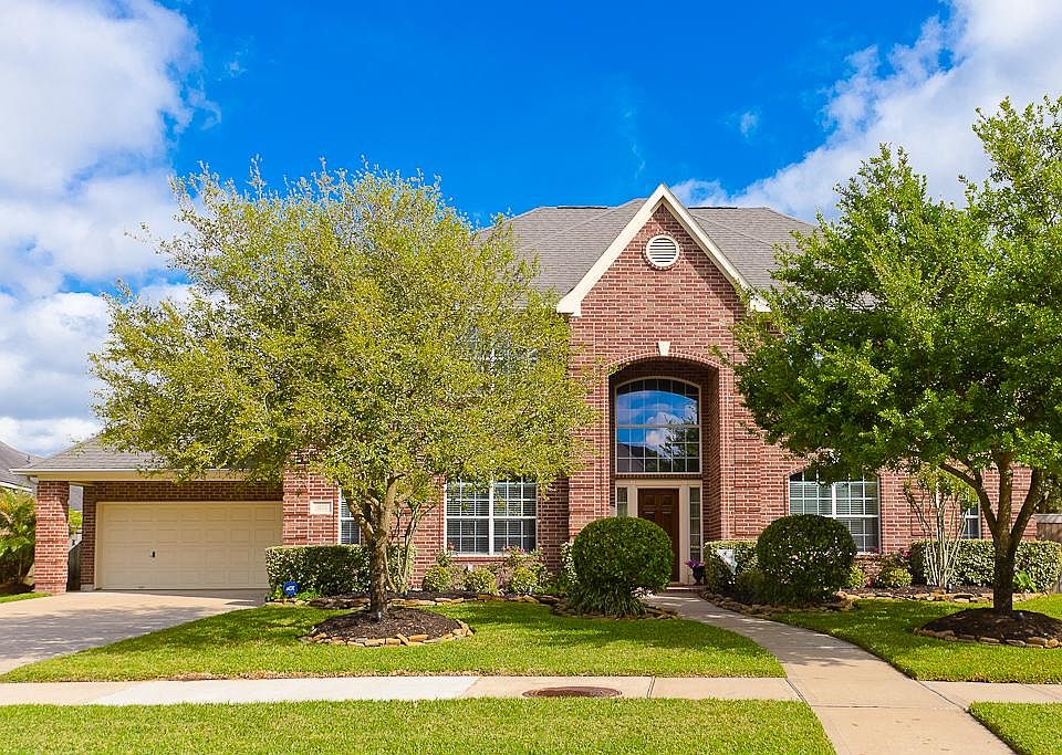Gorgeous Curb Appeal. Notice the Double Wide Driveway.