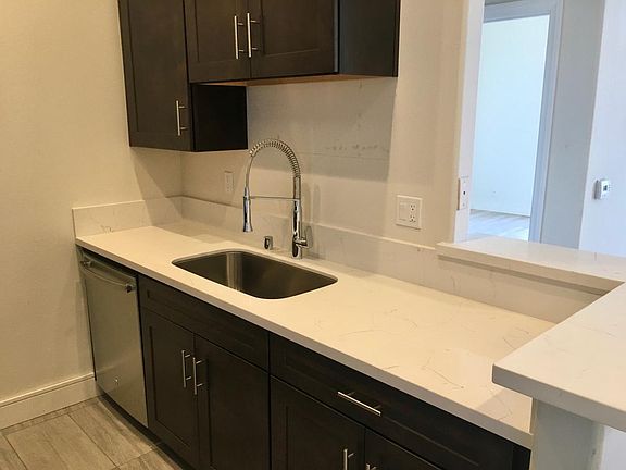 Custom made self closing cabinets and dishwasher