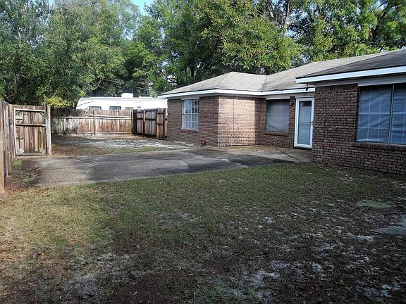 back Yard enclosed with 6' Fence look North