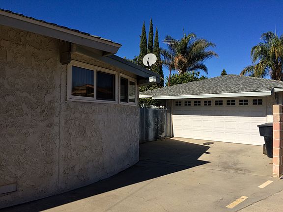 Two car garge w/ gates