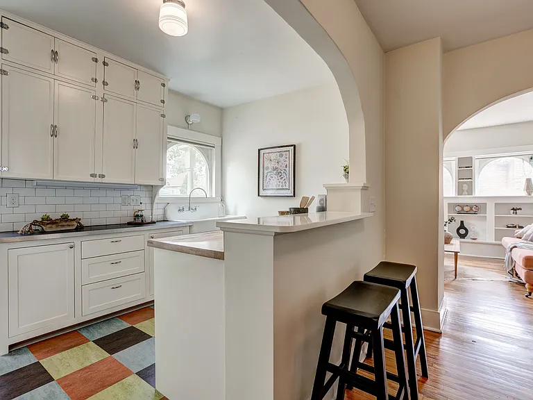 kitchen with original farmhouse sink and upper cabinets +custom built lower cabinets