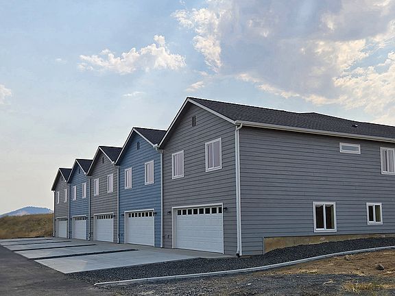 Garage entrance to Edington Townhomes through a private driveway.