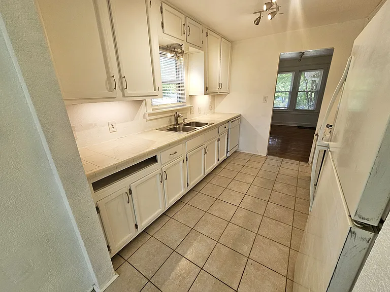 Kitchen facing front of unit