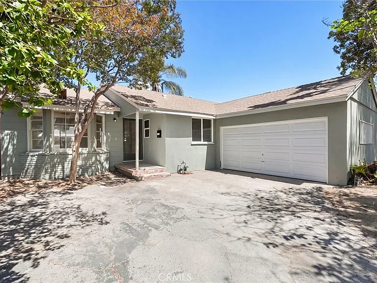 7656 Teesdale Ave — Photo 1