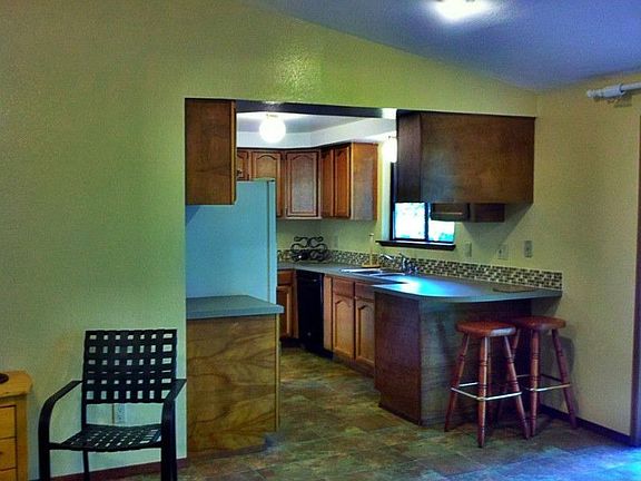 The Family Room has direct access to the kitchen and a slider accessing the expanded deck which facing South is drenced in sunshine.