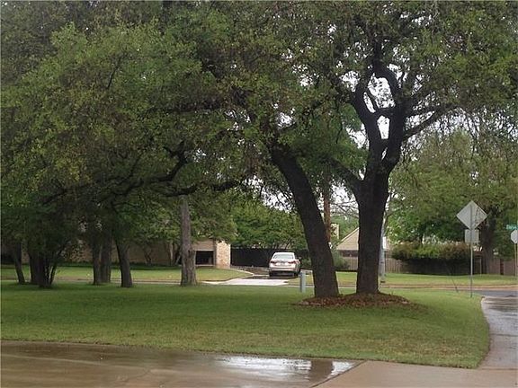 Wide Yard - Front side from driveway to corner of lot @Chelsea Moor Dr.  Beautiful Oak trees (Area deer nestle under trees at night)