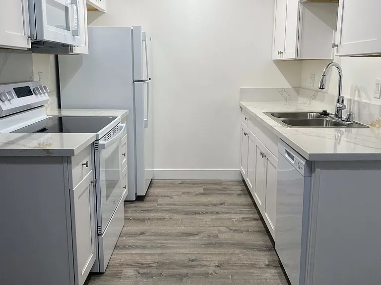 Village Apartments — Photo 16