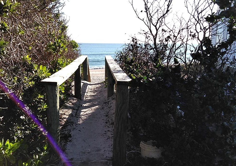 across the street there is a private walkway to the beach!