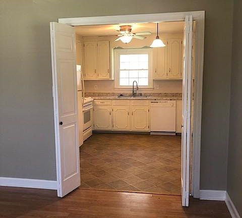 Den/Living Room off the front door looking into the kitchen