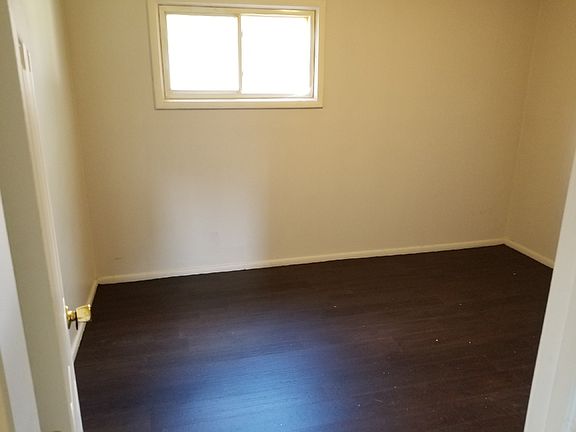Bedroom 1 with brand new laminate wood floors, bedroom to be