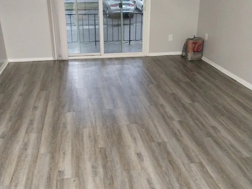 Living room of one of the 2-bedroom / bathroom units with a patio/balcony.