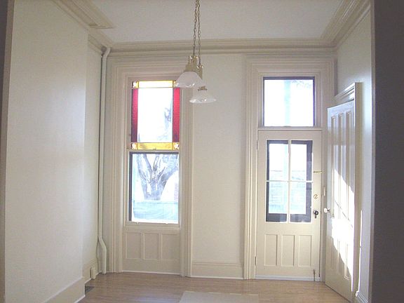 First floor rear - stained glass window and door to back porch