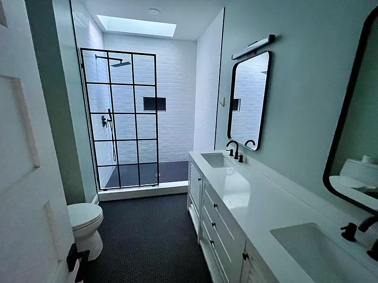 Master bedroom bathroom with shower skylight