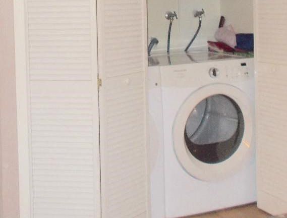 convenient Washer/ Dryer hookups in kitchen large closet.
