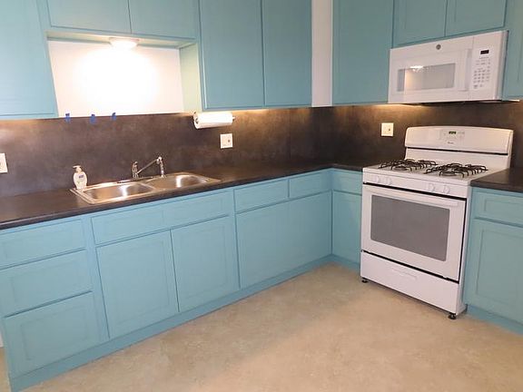 kitchen sink, range, microwave, specialized dimmable lighting. Ceiling fan with light.