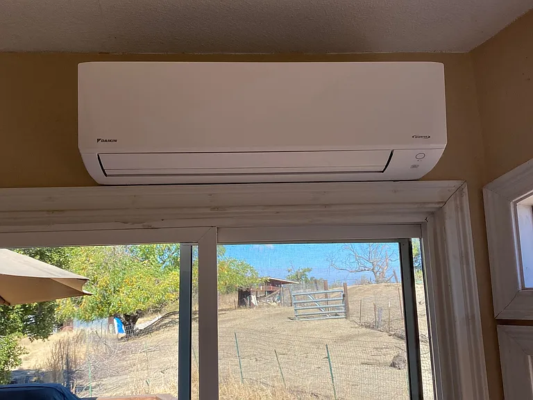 Newer hear pump provides heat and air conditioning. There's a second one in the main bedroom.