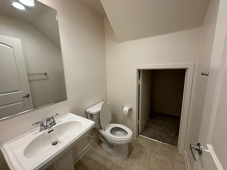 2nd floor: half bathroom with small closet