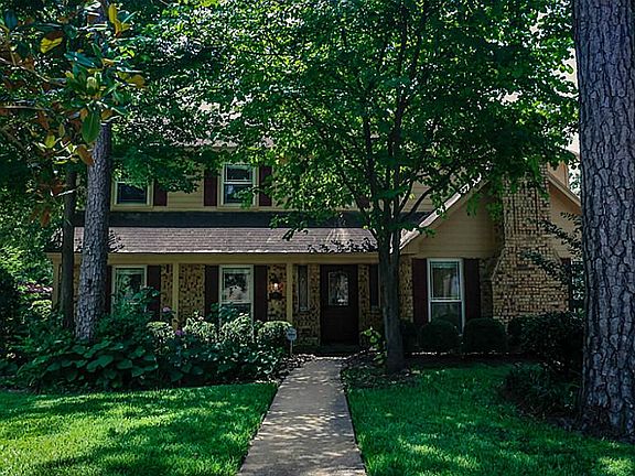 Deep front yard. Front walkway gives exterior character.