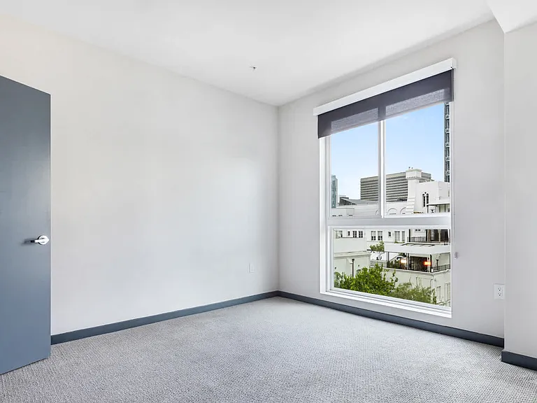 Bedroom with Carpeting