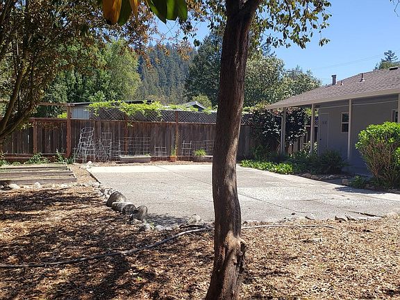 Large back fenced yard.