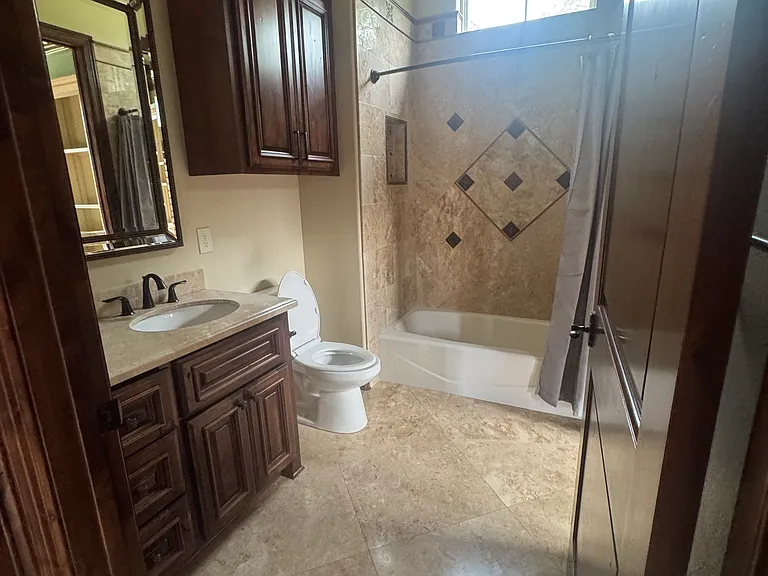 Full bath off entry and office