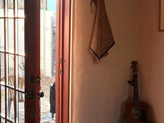 Great room opens to the private courtyard.