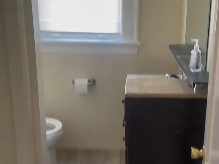 Bathroom view 1 shows vanity area.