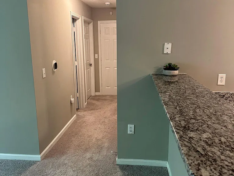 Bar Looking Down Hallway - Ecobee Smart Thermostat on Wall