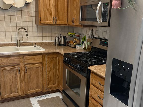 Kitchen with a skylight to give natural sunlight.