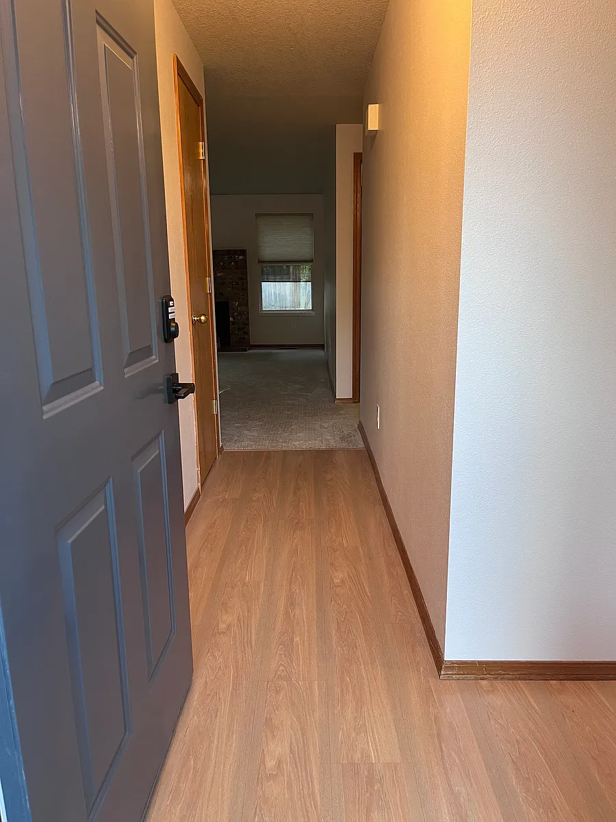 Welcome! Hallway entry - Bedroom #3 to the right, rest of the house straight ahead. Hall closet on left. - 11655 SW Gallo Ave