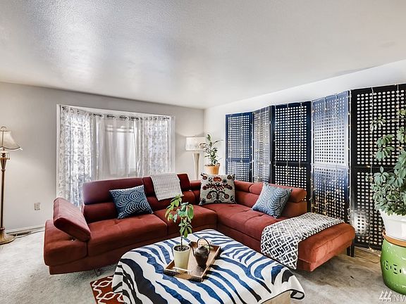 View of the living room from the formal dining area. 