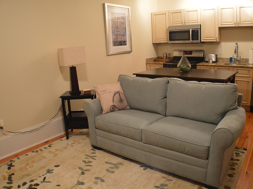 Loveseat with side table and lamp